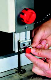 ...an upper blade guides that adjust toollessly...