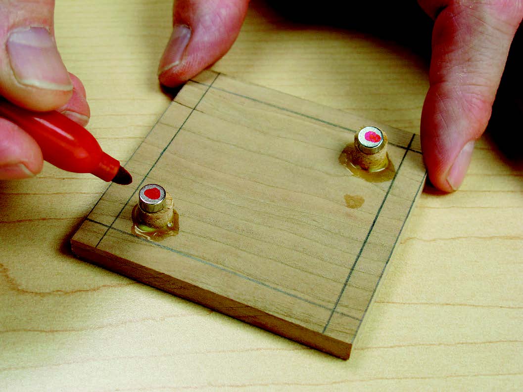 Installing magnets in keepsake box lid