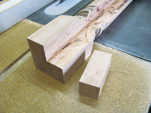 Cut kitchen island leg and scrap support block