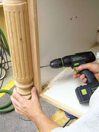 Installing kitchen island legs with support pieces