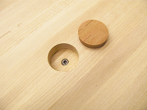 Screws installed on kitchen island casework