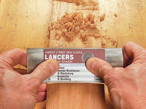 Using a scraper with a kitchen magnet attached