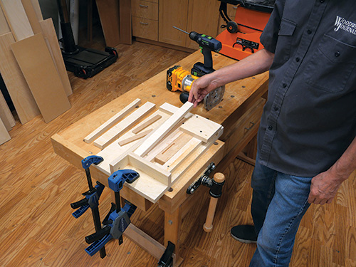 Installing second set of spacers for spurtle slat cuts