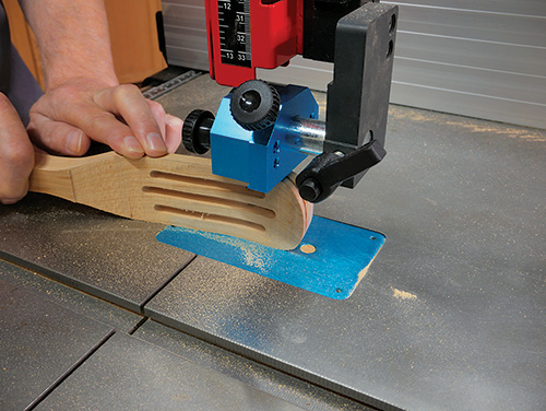 Shaping back portion of spurtle head