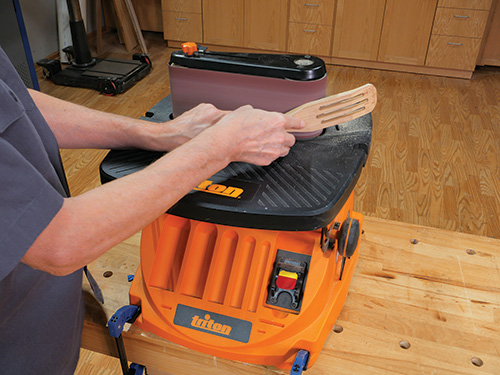 Smoothing top portion of spurtle head