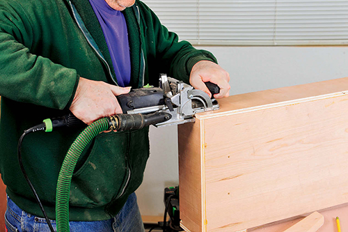 The Domino also cuts mortises in drawer box for the loose tenons that will join the box and legs together.