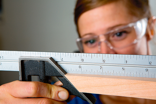 Taking measurements for laptop desk apron parts