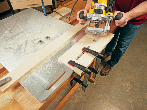 Routing tool storage holes in shop cart tabletop