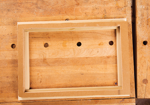 Back face of lending library door frame