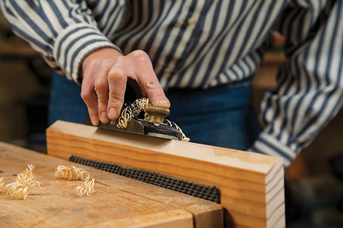 Planing edges of lending library roof