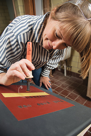 Adding text to a woodworking project with HotStamp Letters.