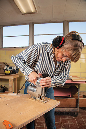 Cutting lending library panel with a jigsaw