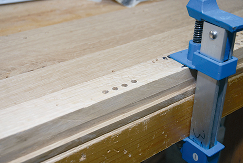 Drilling holes for installing shelf pins