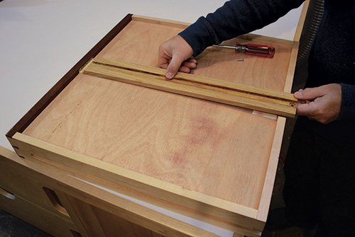 Installing drawer slide to fit into the desk front