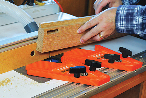 Cutting grooves in Limbert hutch legs at router table