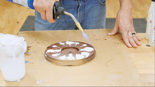 Heating epoxy filling in lollipop clock pips