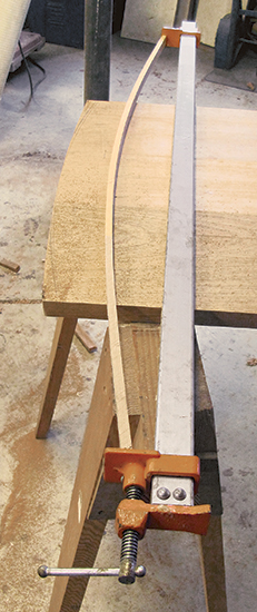 Forming bowed side desk curve with bar clamp