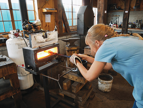Firing plane blade in a forge