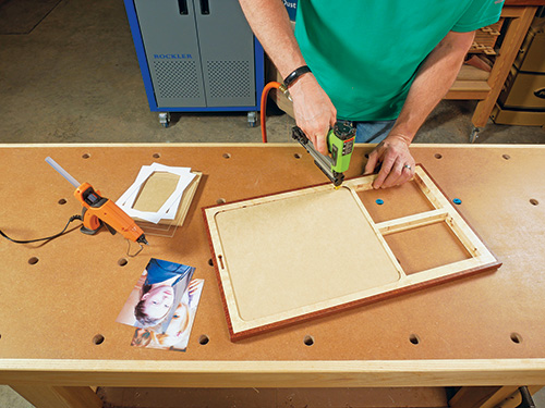 Installing backing on mirror frame with pin nailer