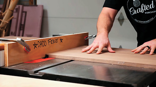 Sacrificial dado fence on a table saw