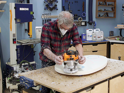Smoothing kidney table edges with router