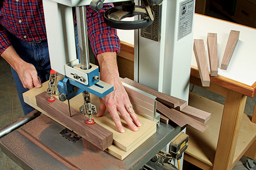 Two taper cuts form the inner angled faces of each leg. These rip cuts are simple to make at the band saw with a shop-made jig.