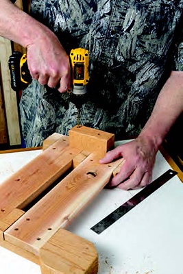 Attaching cleat to picnic table bench side assembly