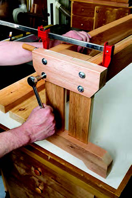Using bolts to secure picnic table benchtop