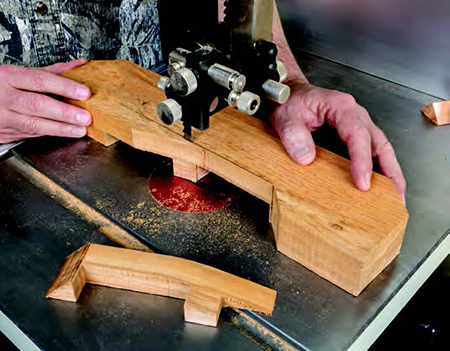Using band saw to shape bottom edge of picnic table bench