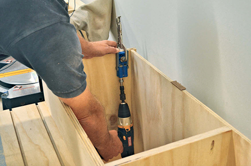 The author secured the cabinet tops to the sides and dividers with pocket screws.