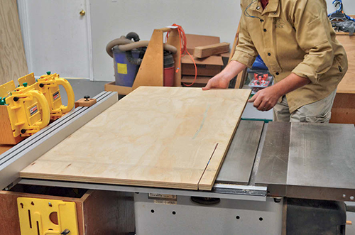 Once the full sheets are crosscut using a circular saw, the parts are cut to final size on the table saw.