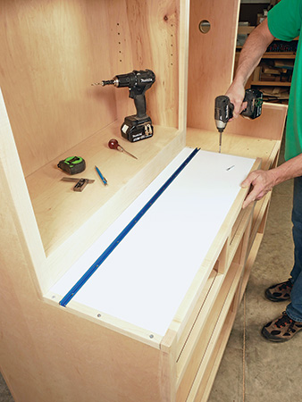 Installing work surface with t-track into miter saw station