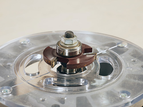 Slot cutting bit installed in a router