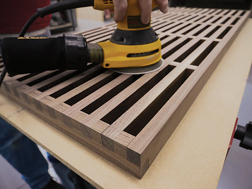 Sanding out glue squeeze out and uneven slats on modern coffee table joinery