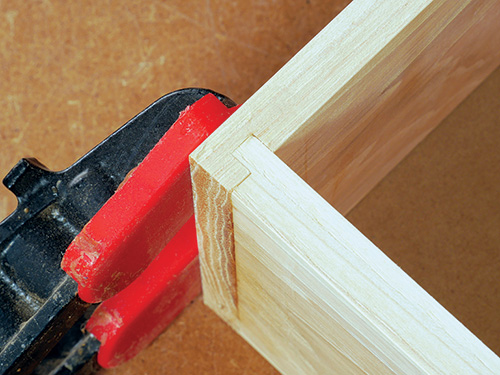 Close-up of rabbet and dado joint in nesting table drawer