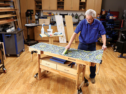 Gluing wallpaper pattern on divider panel