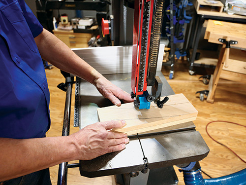 Cutting band saw dividers with a band saw