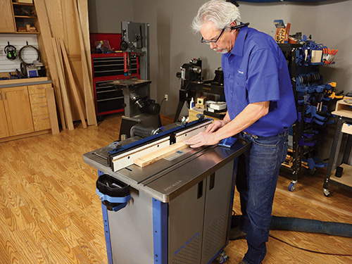 Routing slot for divider panel