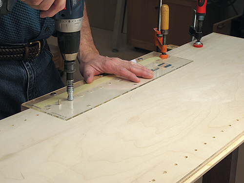 Drilling shelf pins for Murphy bed cabinet with drilling jig