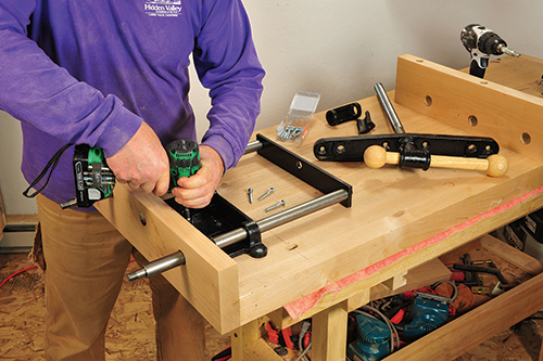 Attaching vise to bottom side of workbench