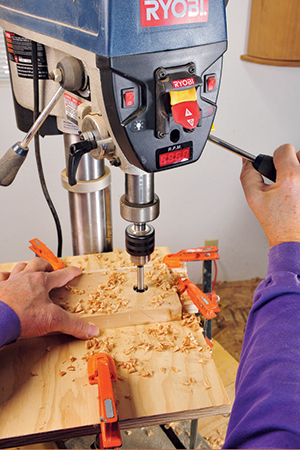 Using drill press to create workbench stretcher joinery