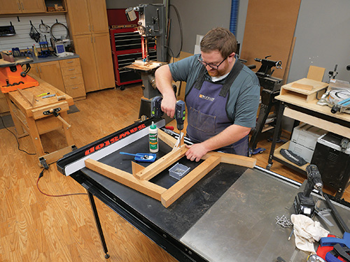 Setting up seat support on outdoor love seat