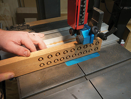 Band sawing out plugs for outdoor love seat