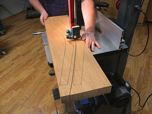 Band sawing love seat parts into rough shapes