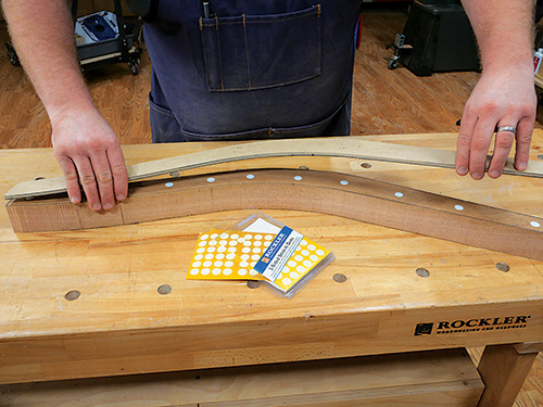 Taping template to love seat part