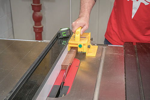 Ripping strips of bubinga on a table saw
