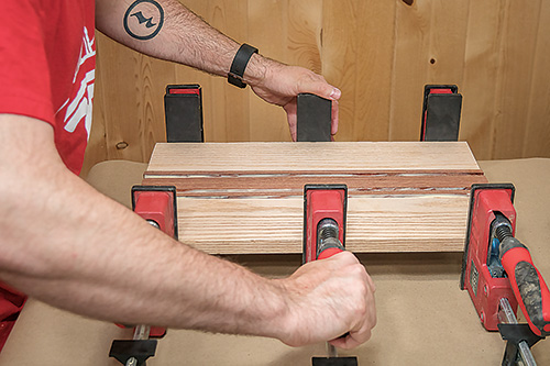Gluing and clamping over the sink cutting board pieces