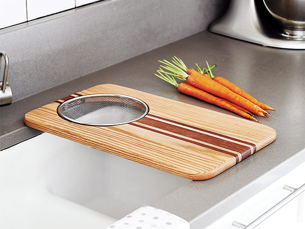Strainer and cutting board for kitchen sink