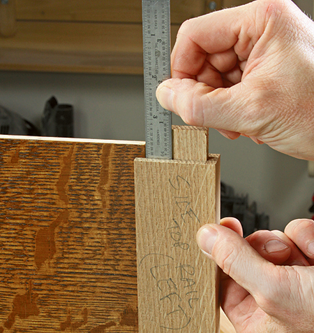 Measuring overage length of storage chest panel