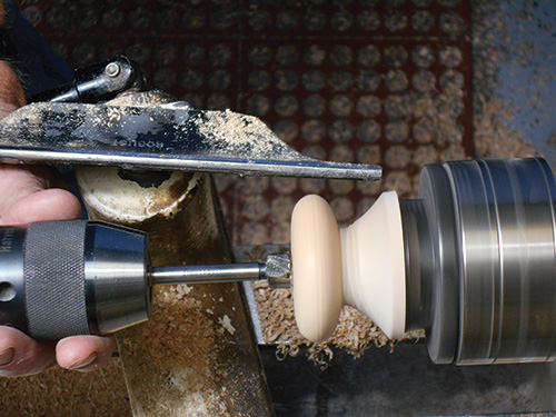 Drilling center hole in paper towel holder